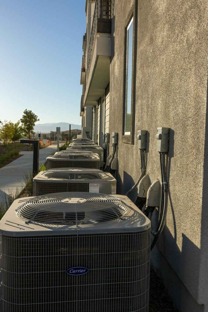 Apartment HVAC units being serviced by Triangle Cooling and Heating in Mesa, AZ